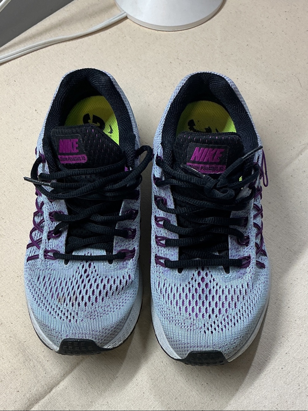 Nike Women's running Shoes in Light Blue with Purple Accents